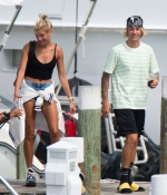 hailey-baldwin-and-justin-bieber-are-spotted-on-a-boat-as-they-arrive-on-their-post-engagement-trip-in-the-bahamas-4.jpg