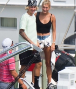 hailey-baldwin-and-justin-bieber-are-spotted-on-a-boat-as-they-arrive-on-their-post-engagement-trip-in-the-bahamas-5.jpg
