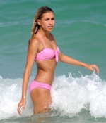 HAILEY-BALDWIN-in-Bikini-at-the-Beach-in-Miami-2015-pink-bikini-15.jpg
