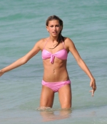 HAILEY-BALDWIN-in-Bikini-at-the-Beach-in-Miami-2015-pink-bikini-2.jpg