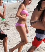 HAILEY-BALDWIN-in-Bikini-at-the-Beach-in-Miami-2015-pink-bikini-3.jpg
