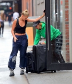 hailey-baldwin-and-justin-bieber-seen-pushing-a-couple-of-large-suitcases-as-they-left-the-milk-studios-in-new-york-city-0.jpg