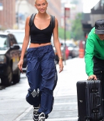 hailey-baldwin-and-justin-bieber-seen-pushing-a-couple-of-large-suitcases-as-they-left-the-milk-studios-in-new-york-city-1.jpg