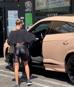 hailey-bieber-rocks-black-bike-shorts-with-matching-crop-top-while-stopping-for-a-healthy-juice-in-west-hollywood-california-1.jpg