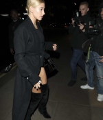 hailey-baldwin-arriving-at-sexy-fish-restaurant-in-london-black-outfit-denim-shorts-jeans-high-leather-boots-3.jpg