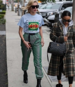 hailey-baldwin-black-ankle-boots-booties-at-zinque-restaurant-in-west-hollywood-los-angeles-gucci-outfit-cargo-pants-.jpg