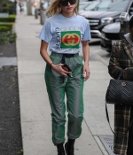 hailey-baldwin-black-ankle-boots-booties-at-zinque-restaurant-in-west-hollywood-los-angeles-gucci-outfit-cargo-pants-3.jpg