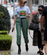hailey-baldwin-black-ankle-boots-booties-at-zinque-restaurant-in-west-hollywood-los-angeles-gucci-outfit-cargo-pants-6.jpg