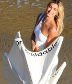 hailey-bieber-at-a-photoshoot-for-bare-minerals-on-the-beach-in-malibu-07-23-2019-21.jpg