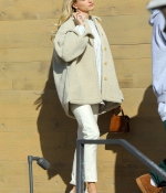 hailey-bieber-and-justin-bieber-November-22-At-Nobu-in-Malibu-on-her-birthday-beige-outfit-heels-5.jpg