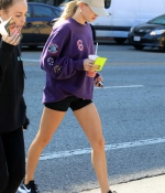 hailey-bieber-november-25-Picks-Up-a-Healthy-Smoothie-in-west-Hollywood-purple-sweatshirt-nike-black-shorts-legs-10.jpg