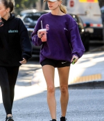 hailey-bieber-november-25-Picks-Up-a-Healthy-Smoothie-in-west-Hollywood-purple-sweatshirt-nike-black-shorts-legs-12.jpg