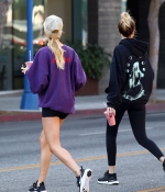 hailey-bieber-november-25-Picks-Up-a-Healthy-Smoothie-in-west-Hollywood-purple-sweatshirt-nike-black-shorts-legs-19.jpg