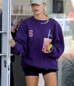 hailey-bieber-november-25-Picks-Up-a-Healthy-Smoothie-in-west-Hollywood-purple-sweatshirt-nike-black-shorts-legs-22.jpg