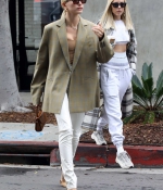 hailey-bieber-looks-stylish-in-green-blazer-and-white-pants-as-she-steps-out-for-coffee-in-west-hollywood-los-angeles-3.jpg