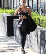 hailey-bieber-shows-off-her-stunning-figure-in-a-black-sports-bra-and-leggings-as-she-hits-a-pilates-session-in-los-angeles-1.jpg