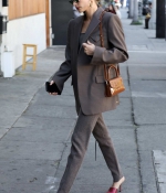 hailey-bieber-looks-stylish-in-a-brown-suit-and-red-shoes-as-she-steps-out-for-lunch-in-los-angeles-10.jpg