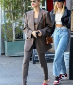 hailey-bieber-looks-stylish-in-a-brown-suit-and-red-shoes-as-she-steps-out-for-lunch-in-los-angeles-2.jpg