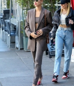 hailey-bieber-looks-stylish-in-a-brown-suit-and-red-shoes-as-she-steps-out-for-lunch-in-los-angeles-4.jpg