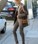 hailey-bieber-looks-stylish-in-a-brown-suit-and-red-shoes-as-she-steps-out-for-lunch-in-los-angeles-6.jpg