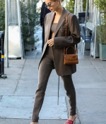 hailey-bieber-looks-stylish-in-a-brown-suit-and-red-shoes-as-she-steps-out-for-lunch-in-los-angeles-7.jpg