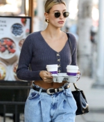 hailey-bieber-shows-off-her-midriff-in-a-cropped-sweater-while-making-a-coffee-run-in-beverly-hills-california-0.jpg