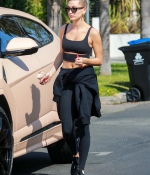 hailey-bieber-sports-a-black-workout-top-and-leggings-during-a-lunch-outing-at-backyard-bowl-in-west-hollywood-california-0.jpg