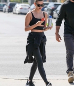 hailey-bieber-sports-a-black-workout-top-and-leggings-during-a-lunch-outing-at-backyard-bowl-in-west-hollywood-california-10.jpg