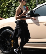 hailey-bieber-sports-a-black-workout-top-and-leggings-during-a-lunch-outing-at-backyard-bowl-in-west-hollywood-california-11.jpg