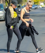 hailey-bieber-sports-a-black-workout-top-and-leggings-during-a-lunch-outing-at-backyard-bowl-in-west-hollywood-california-4.jpg