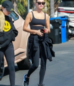 hailey-bieber-sports-a-black-workout-top-and-leggings-during-a-lunch-outing-at-backyard-bowl-in-west-hollywood-california-5.jpg