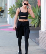 hailey-bieber-sports-a-black-workout-top-and-leggings-during-a-lunch-outing-at-backyard-bowl-in-west-hollywood-california-6.jpg