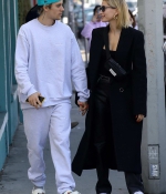 hailey-bieber-and-justin-bieber-share-a-kiss-while-out-for-a-stroll-in-west-hollywood-california-4.jpg