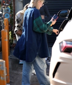 hailey-bieber-flaunts-her-toned-abs-as-she-steps-out-for-lunch-with-friends-in-beverly-hills-california-8.jpg