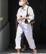 hailey-bieber-dons-all-white-for-a-business-meeting-in-los-angeles-2.jpg