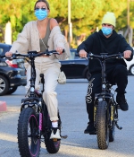 hailey-bieber-and-justin-bieber-spend-the-afternoon-riding-custom-drew-electric-bikes-in-los-angeles-1.jpg