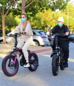 hailey-bieber-and-justin-bieber-spend-the-afternoon-riding-custom-drew-electric-bikes-in-los-angeles-2.jpg