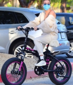 hailey-bieber-and-justin-bieber-spend-the-afternoon-riding-custom-drew-electric-bikes-in-los-angeles-3.jpg