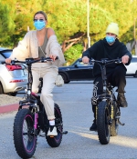 hailey-bieber-and-justin-bieber-spend-the-afternoon-riding-custom-drew-electric-bikes-in-los-angeles-4.jpg