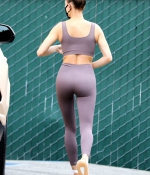 hailey-bieber-displays-her-toned-figure-in-a-crop-top-and-leggings-while-stopping-by-a-medical-building-in-los-angeles-1.jpg
