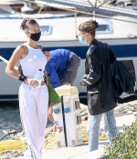 bella-hadid-and-hailey-bieber-arrive-at-the-airport-to-fly-out-on-a-private-jet-after-their-versace-photoshoot-sardinia-italy-2.jpg