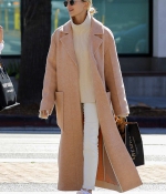 hailey-bieber-wears-a-beige-long-coat-and-nike-air-force-1s-as-she-steps-out-in-los-angeles-3.jpg