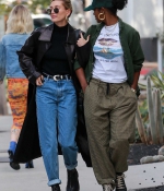 hailey-bieber-steps-out-wearing-a-leather-long-coat-as-she-heads-for-lunch-with-a-friend-in-west-hollywood-california-1.jpg