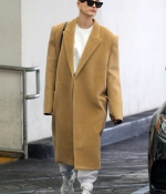hailey-bieber-wears-an-oversized-beige-coat-as-she-makes-a-visit-to-a-doctors-office-in-beverly-hills-los-angeles-2.jpg