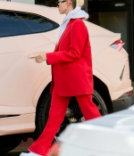 hailey-bieber-December-2-Out-in-Beverly-Hills-red-suit-trendy-hoodie-all-red-sneakers-1.jpg