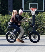 hailey-and-justin-bieber-November-10-2019-Riding-a-Bike-Out-in-Beverly-Hills-3.jpg