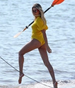 hailey-bieber-November27-Photoshoot-on-the-Beach-in-Miami-in-yellow-swimsuit-0.jpg