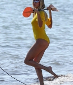 hailey-bieber-November27-Photoshoot-on-the-Beach-in-Miami-in-yellow-swimsuit-18.jpg
