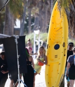 hailey-bieber-November27-Photoshoot-on-the-Beach-in-Miami-in-yellow-swimsuit-21.jpg