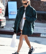 hailey-baldwin-January-11-2018-Out-in-West_Hollywood-green-plaid-shirt-sneakers-style-0.jpg